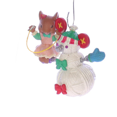 Enesco_Treasury_of_Christmas_Ornaments_599042_Building_a_Sew-man_Christmas_Ornament_1994 Front Left View