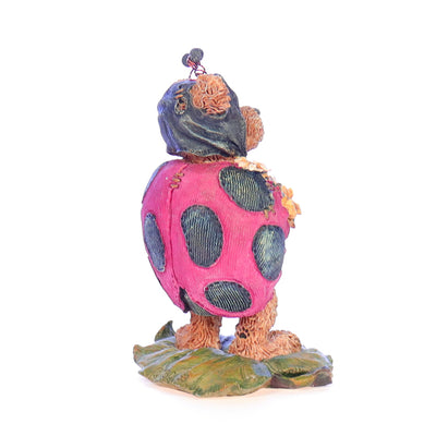 the bearstone collection 227730 tweedle bedeedle  stop and smell the flowers spring figurine 1999 back right